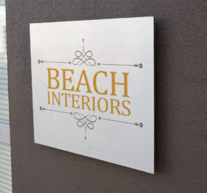Poly metal sign on outside wall